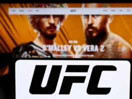 Close-up of UFC logo on cellphone.