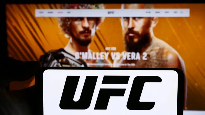 Close-up of UFC logo on cellphone.