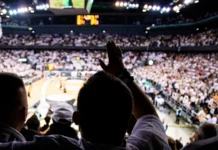 Caitlin Clark’s 3-pointer stands out in Team USA’s 105-64 win Crowd cheering during a basketball game