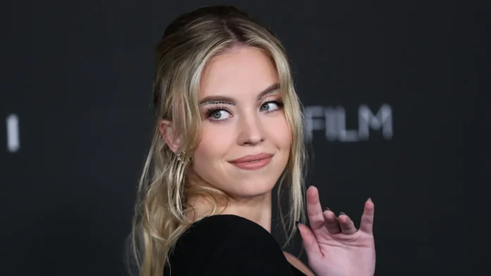 sydney sweeney wearing a saint laurent dress arrives at the