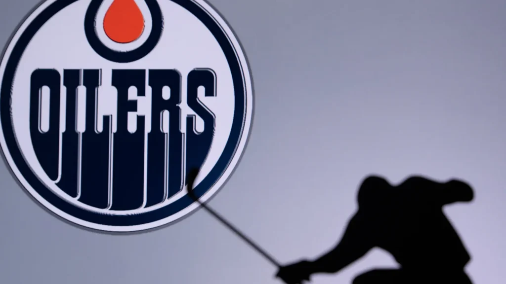 Edmonton Oilers logo and a silhouette of a goaltender