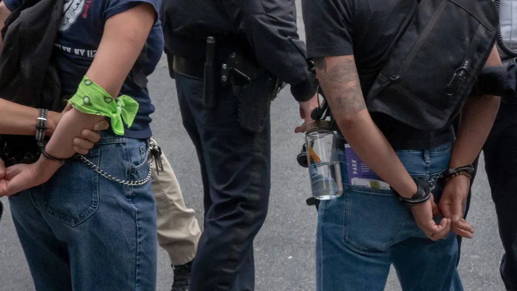 Two people arrested at a rally and march
