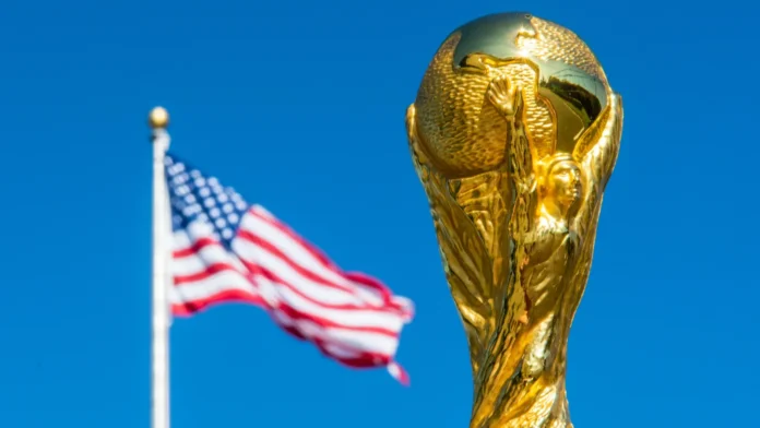 usa new york october 2019 world cup fifa on background Official FIFA World Cup trophy with American flag behind it