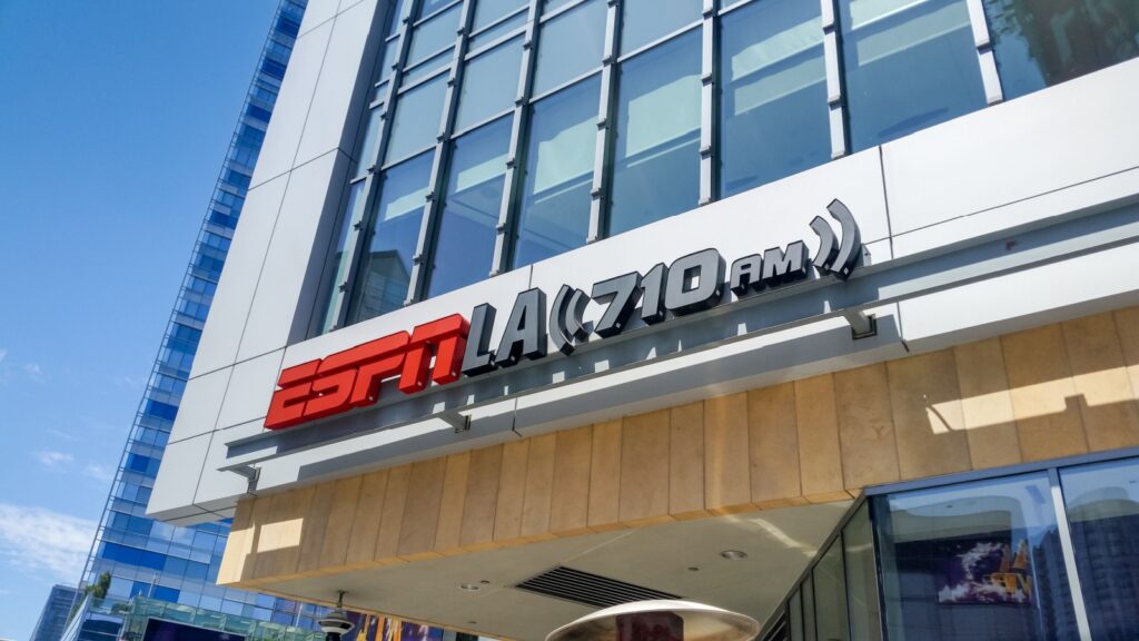 A view of a building front sign for the sports radio station known as ESPN.