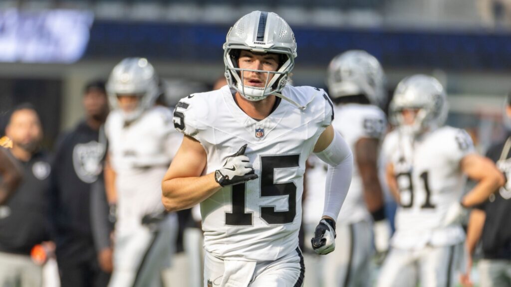 Las Vegas Raiders quarterback Kenny Pickett warms up before an NFL football game against the Los Angeles Chargers at SoFi Stadium.