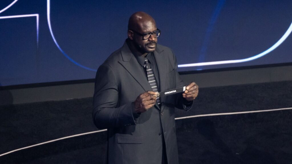Shaquille O’Neal assists during the 2026 FIFA World Cup draw at the John F. Kennedy Center for the Performing Arts in Washington, DC.