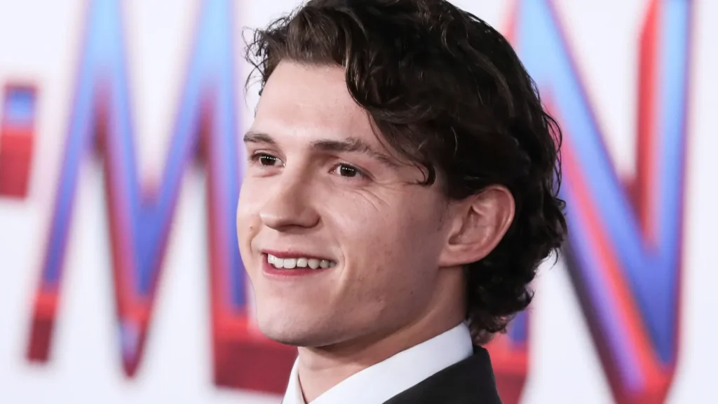 Actor Tom Holland arrives at an event