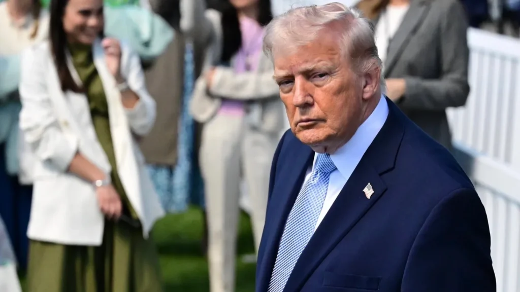 Donald Trump arrives at a stadium.