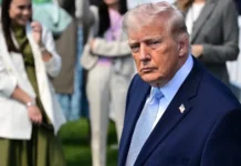 Donald Trump arrives at a stadium