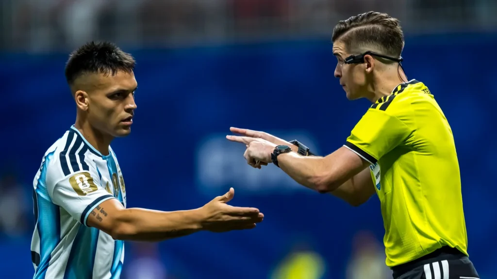 Argentina forward Lautaro Martinez, 22, argues with the referee.