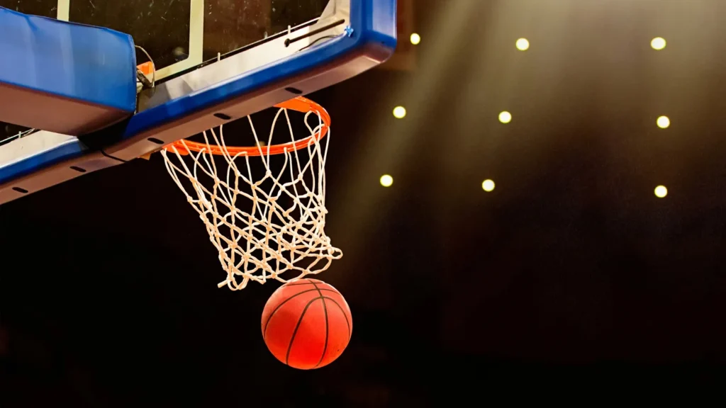 A basketball going through a hoop