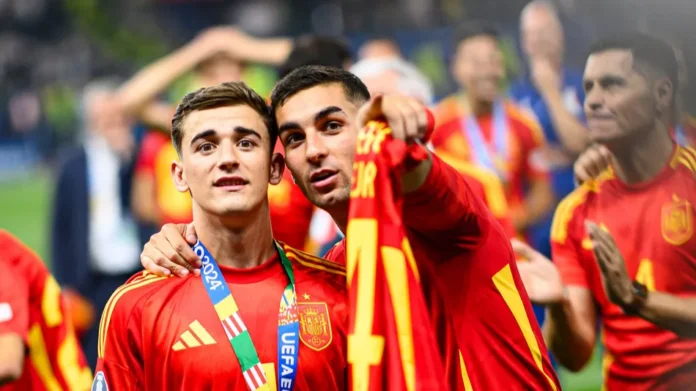 Gavi and Ferran Torres celebrating Spain's UEFA Euro 2024 victory