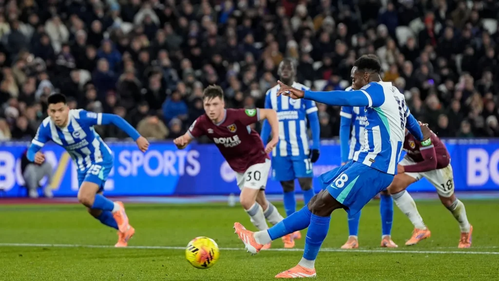 Danny Welbeck of Brighton Hove Albion scores a penalty