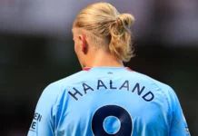 Erling Haaland at the football stadium during a match.