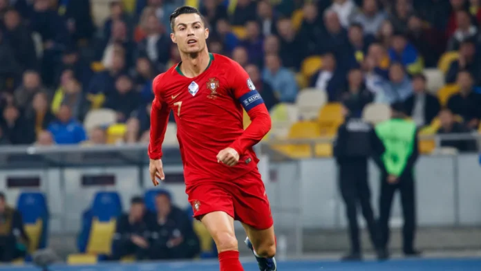 Cristiano Ronaldo wearing a red Portugal national team jersey