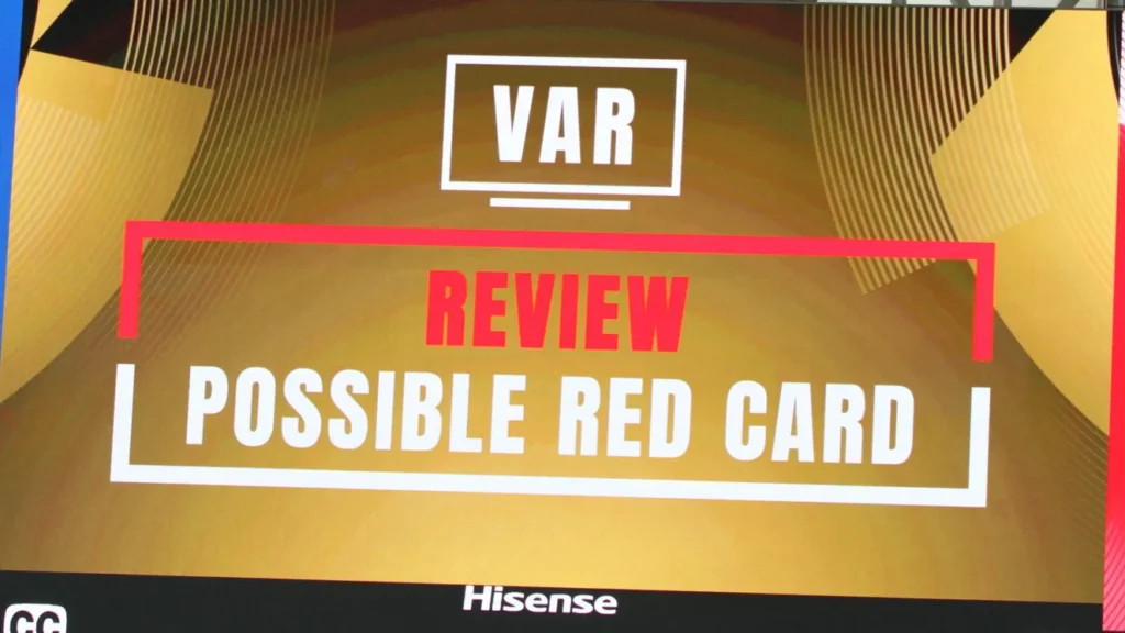 Video Assistant Referee displayed on a big screen in a soccer stadium