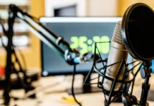 microphone and mixer at the radio station studio broadcasting news