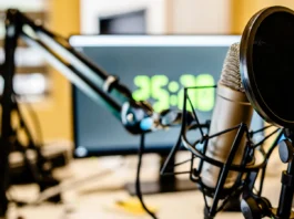 microphone and mixer at the radio station studio broadcasting news