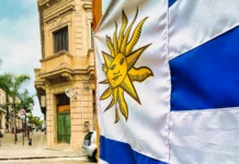 Which countries will host the 2030 FIFA World Cup? montevideo uruguay october 30 2022 the uruguay flag with
