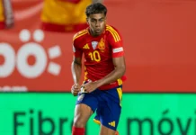 Lamine Yamal in action during a football game.