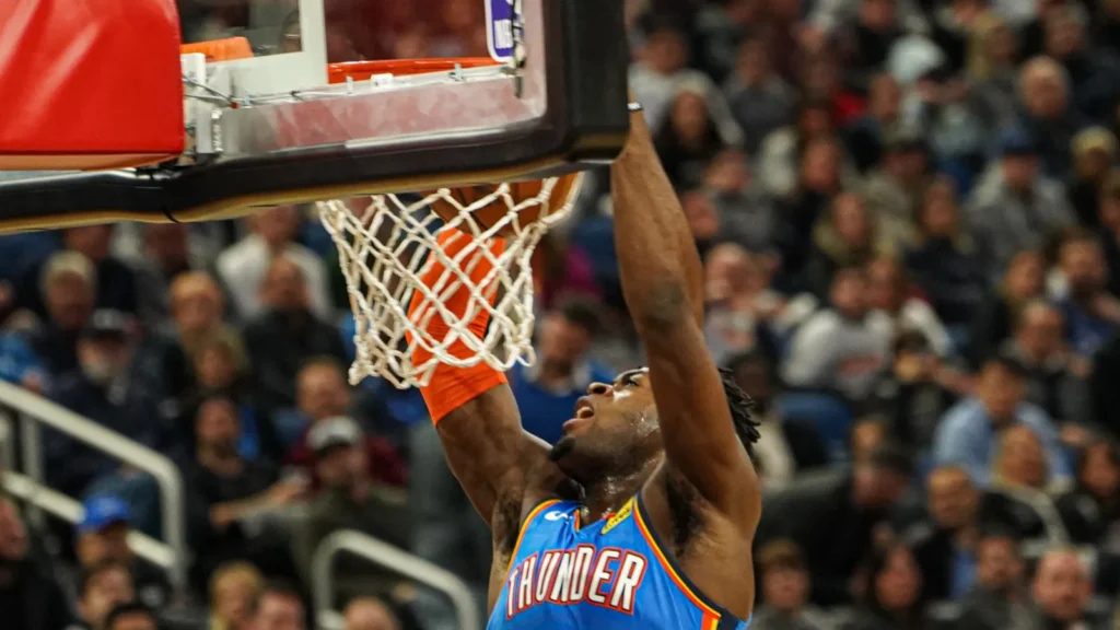 Oklahoma Thunder guard Luquentz Dort makes a dunk