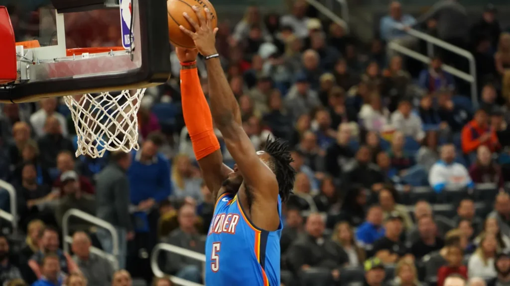 Oklahoma Thunder guard Luquentz Dort makes a dunk
