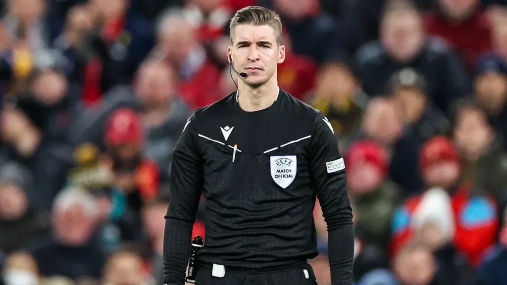 Referee Francois Letexier looks on during the UEFA champions league