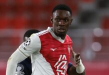 Folarin Balogun wearing a white and red AS Monaco jersey