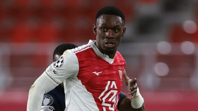 Folarin Balogun wearing a white and red AS Monaco jersey