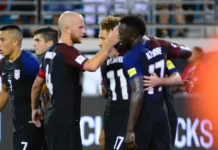 USA soccer team celebrating a goal