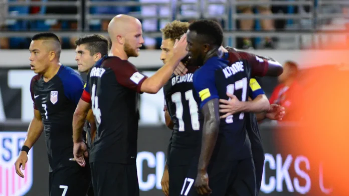 USA soccer team celebrating a goal