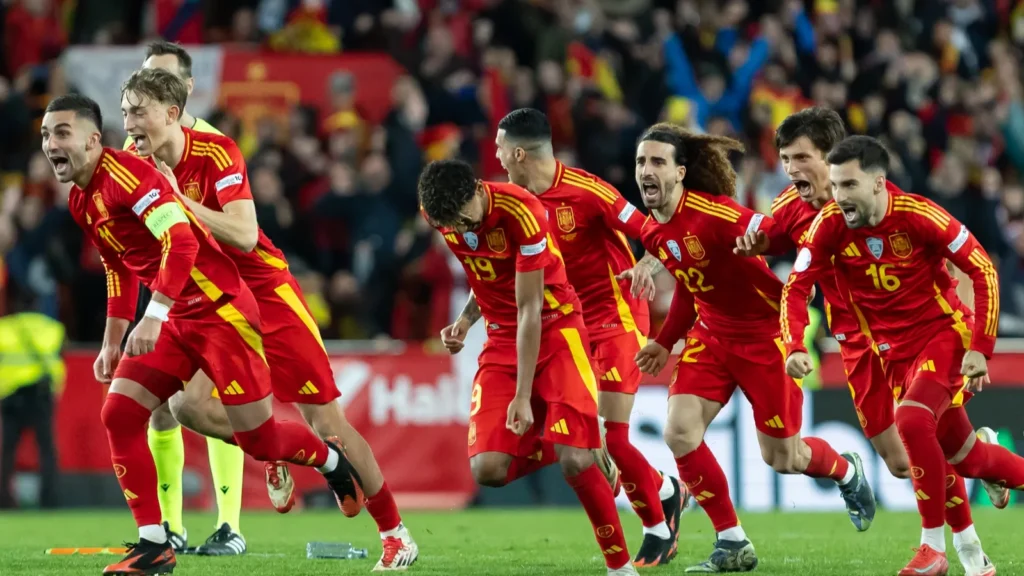 Team Spain celebrating a victory