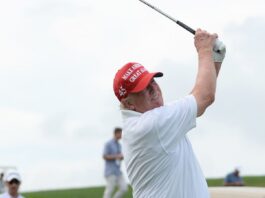 President Trump watches his shot down the fairway during the LIV Pro-Am held at the Trump National Golf Club in Bedminster,NJ.