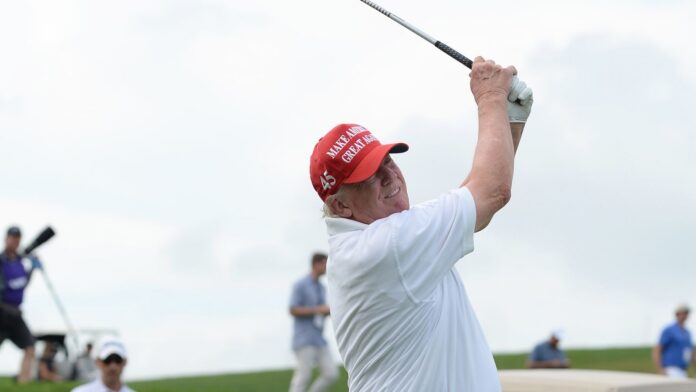 Former President Trump watches his shot down the fairway during the LIV Pro-Am held at the Trump National Golf Club in Bedminster,NJ.