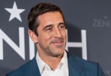 Aaron Rodgers’ Pat McAfee remarks reportedly leave ESPN leadership weighing its next move Aaron Rodgers at an event.