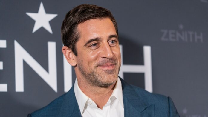 Shutterstock_Aaron Rodgers_2382008695 Aaron Rodgers at an event.