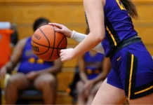 Caitlin Clark and A’ja Wilson sequence sparks referee debate a young female player in a purple jersey on a
