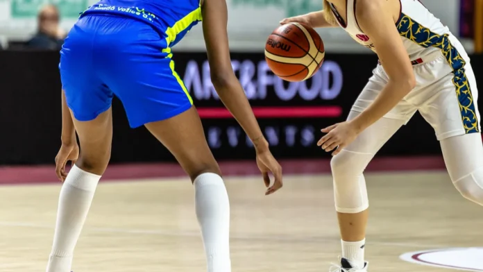 Basketball match in action