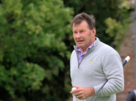 Nick Faldo playing golf.