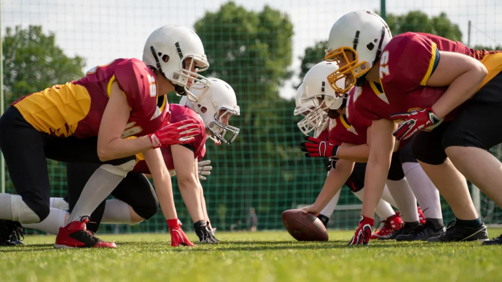 image of female team playing rugby on playground