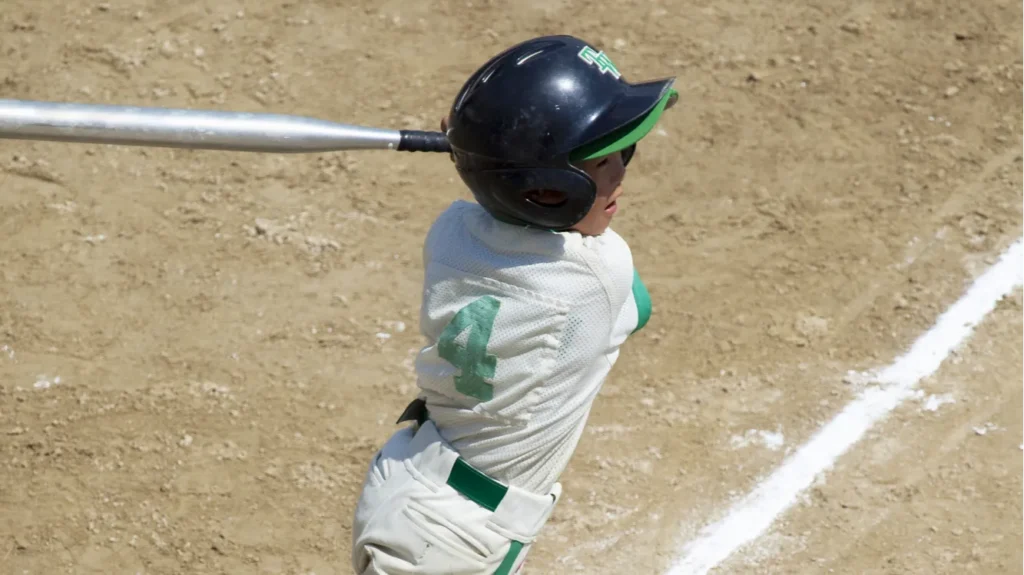 Little League baseball player in action