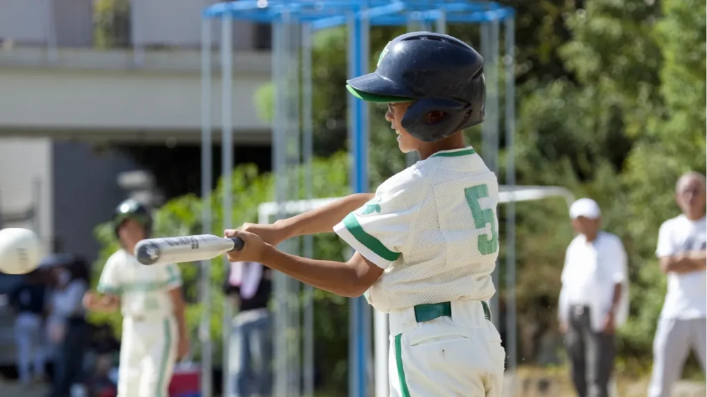 Little League baseball player in action