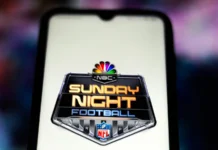 Carrie Underwood faces growing fan backlash over NBC’s Sunday Night Football coverage Logo of NBC's show Sunday Night Football on a smartphone screen.