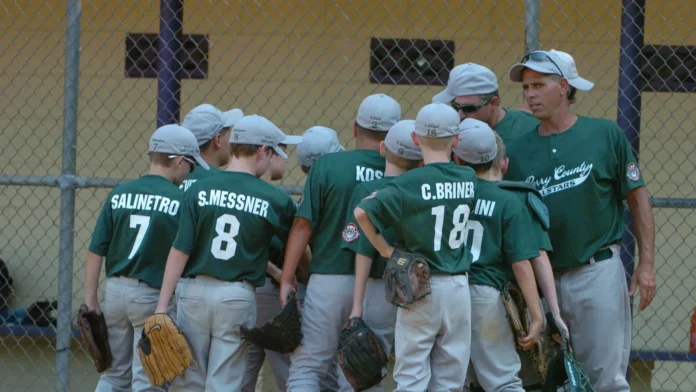 Little League baseball game in action