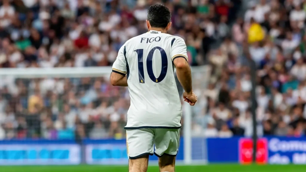 Luis Figo at the football match.