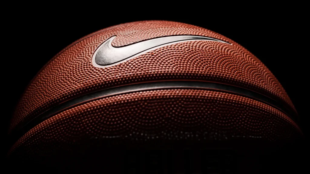 Nike brand basketball placed against a black background.