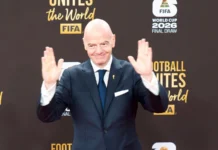 Gianni Infantino’s political ties draw fresh attention as pressure mounts on FIFA chief FIFA President Gianni Infantino speaking at the 2026 World Cup Final Draw ceremony in Washington, D.C.
