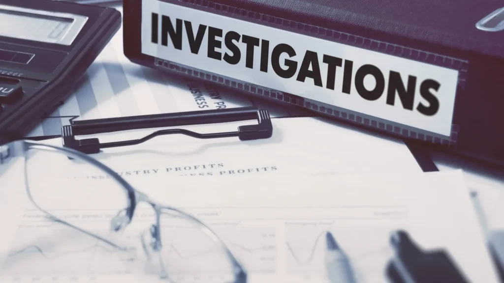 ring binder with inscription investigations