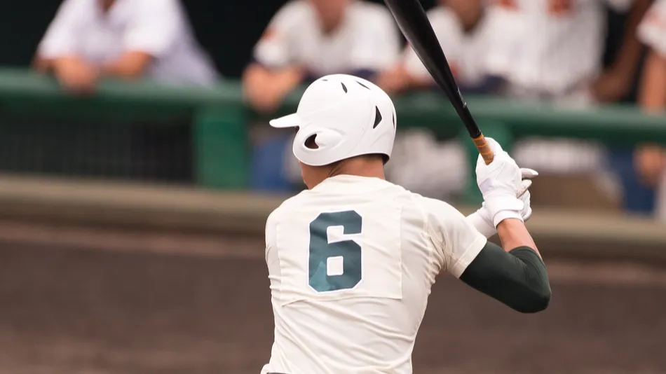 A player bats in a baseball game