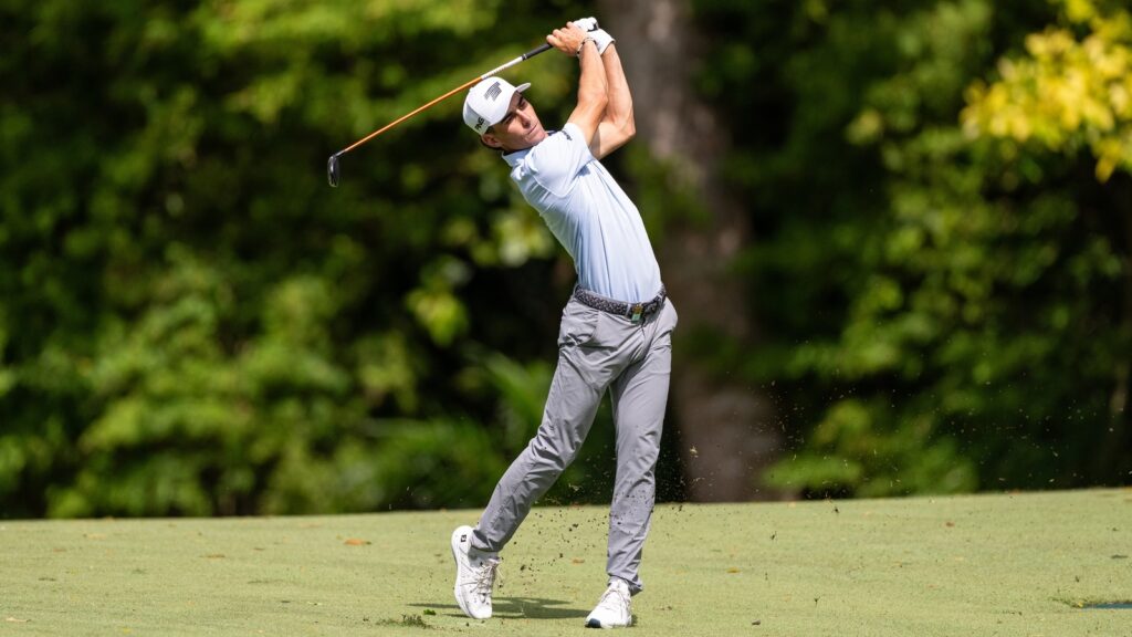 Joaquin Niemann of Torque GC plays his approach shot on the 12th hole